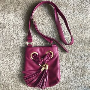 Stylish Fuchsia Crossbody Bag with Tassels